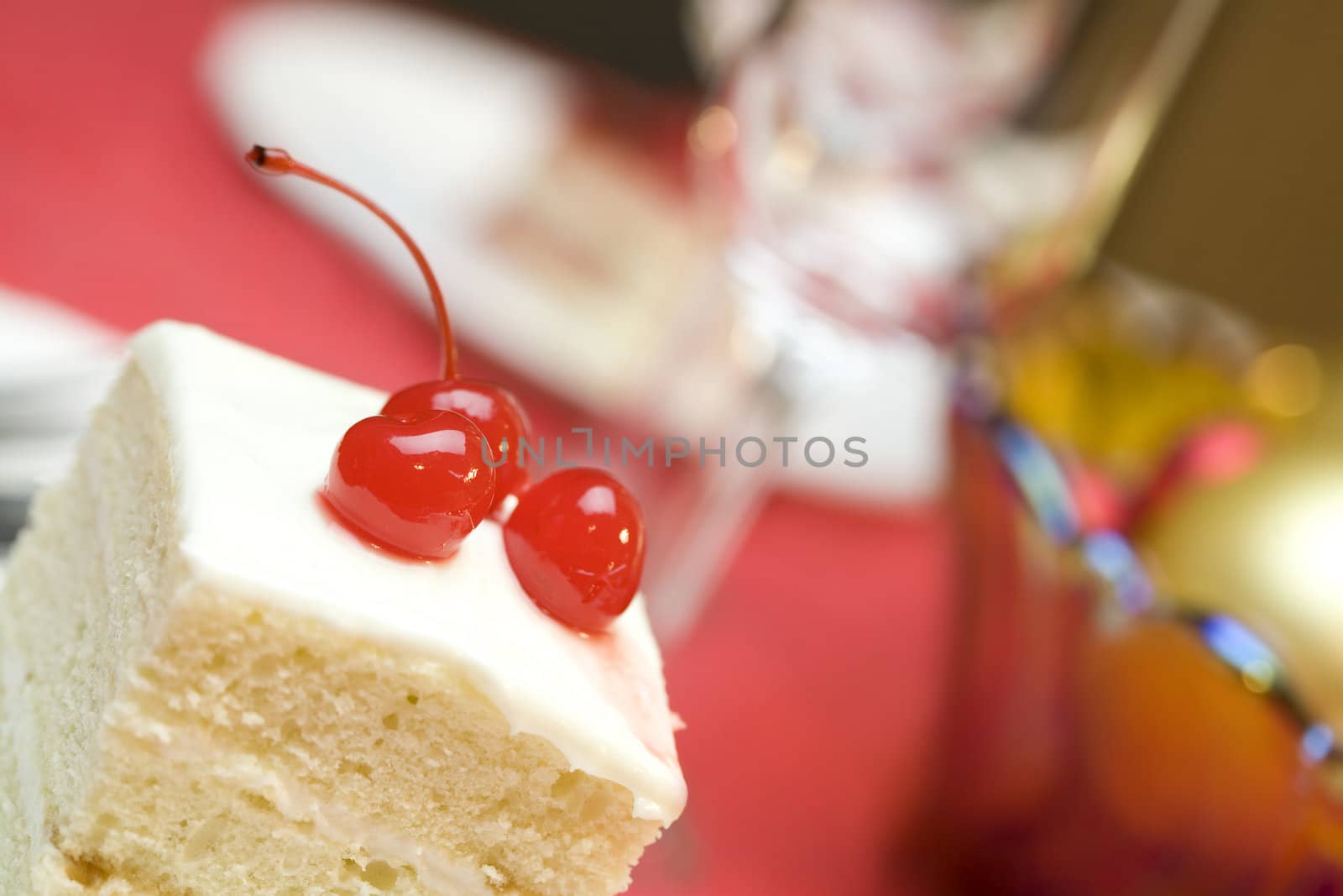 Delicious piece of cake with cherries