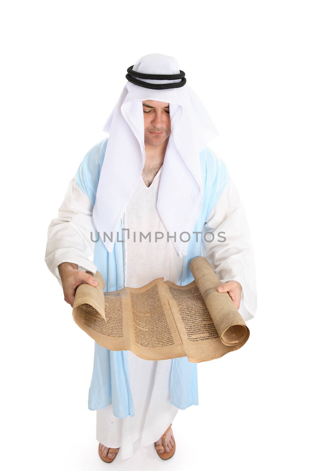 Biblical man or scribe reading holy torah scroll by lovleah