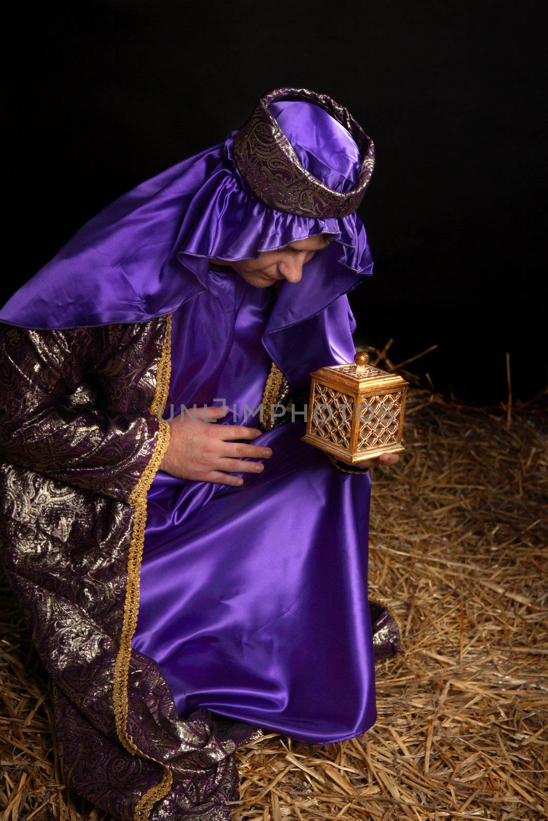 Wise man bowing and holding gift by lovleah