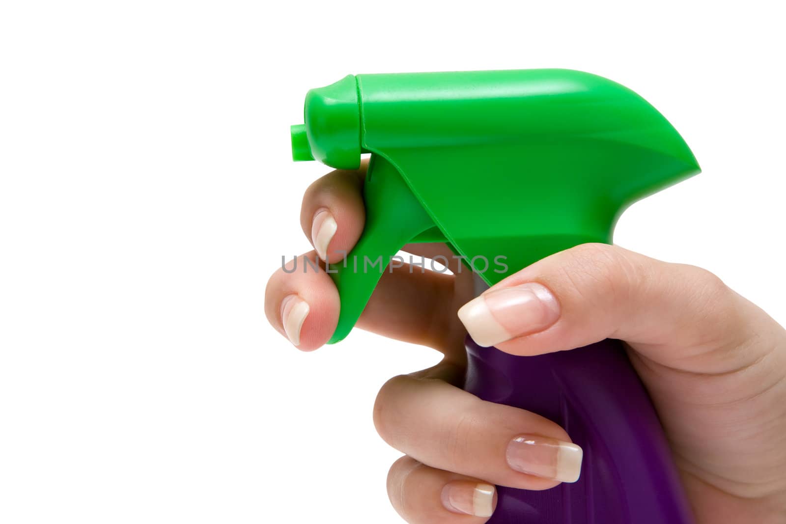 Woman using a spray bottle. Isolated on a white background.