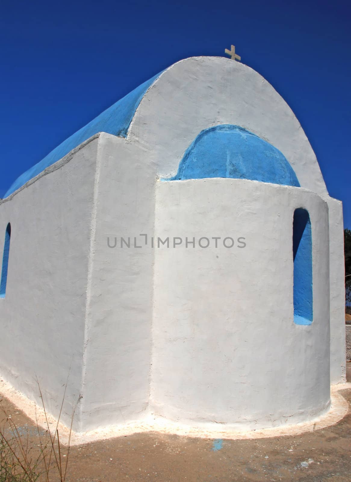 Typical Greek church - white walls and a blue cupola