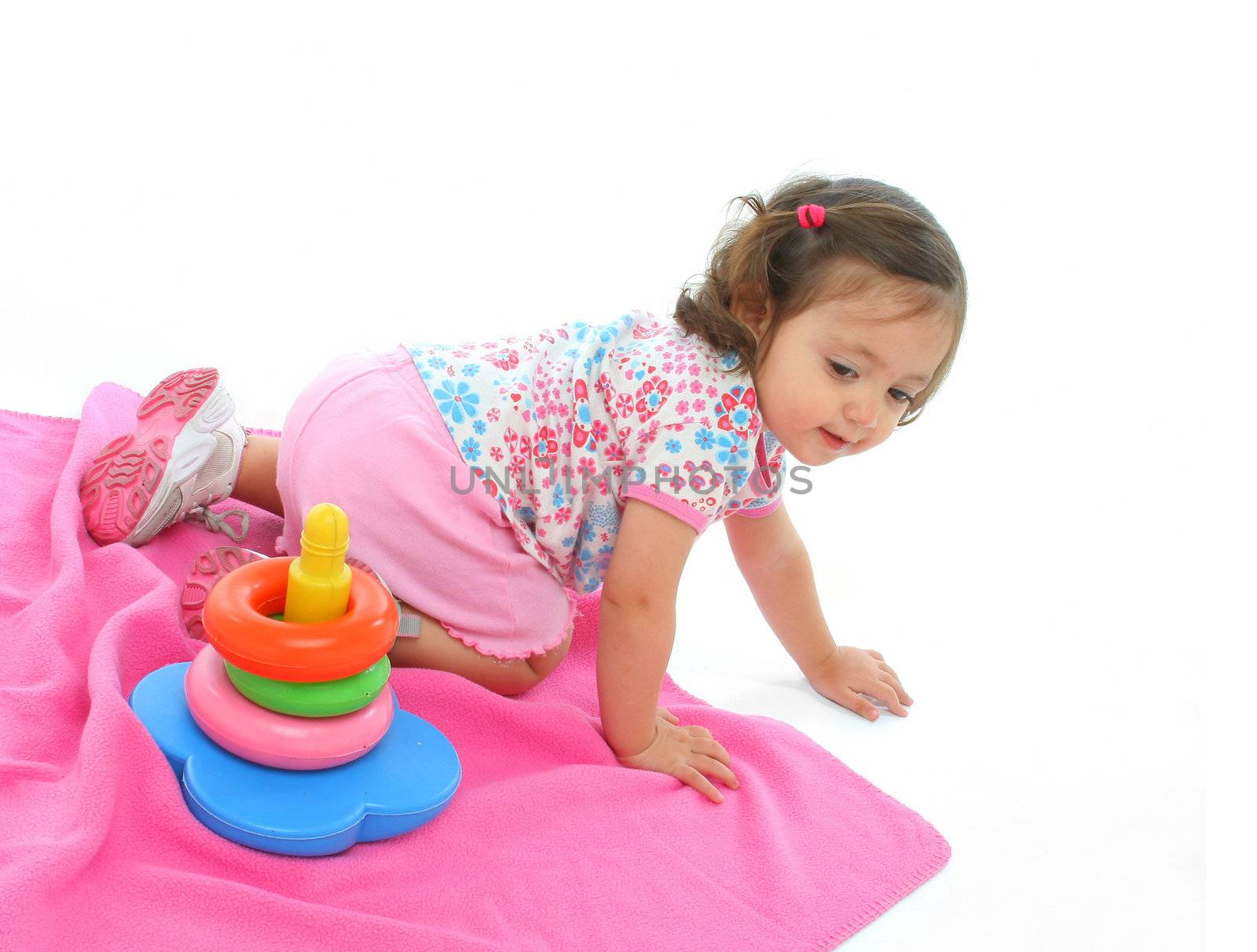 Little girl playing and having fun with generic toy. More pictures of this baby at my gallery
