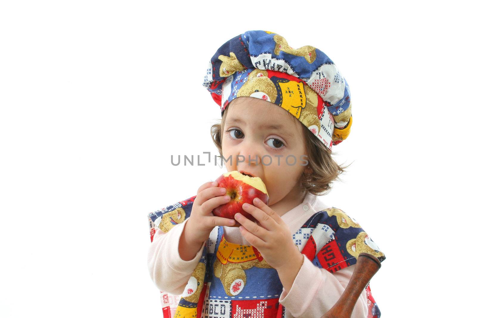 Little girl eating an apple dressed at a cheff by Erdosain