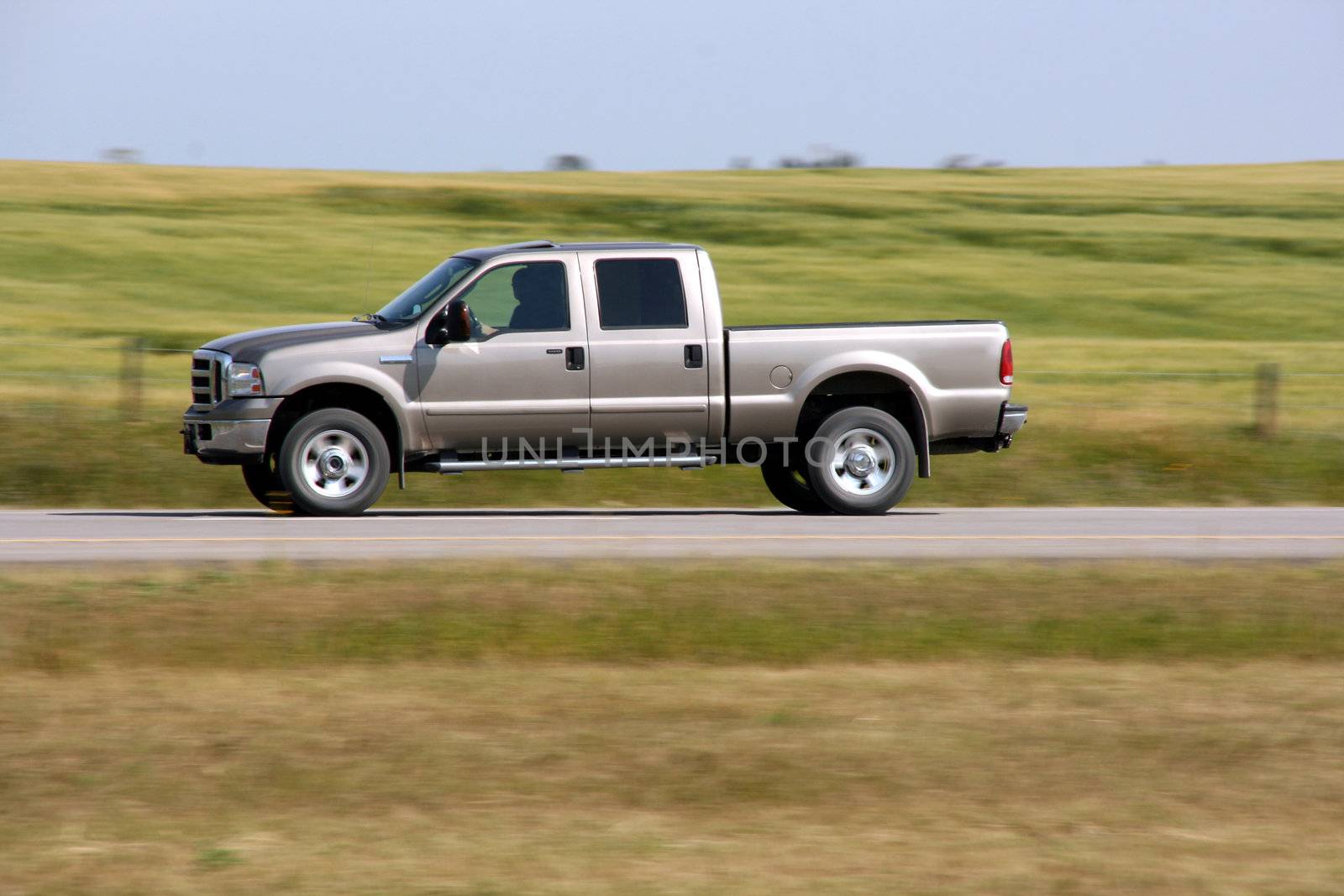 Pick up truck in motion. Speed blur. Road abstract.