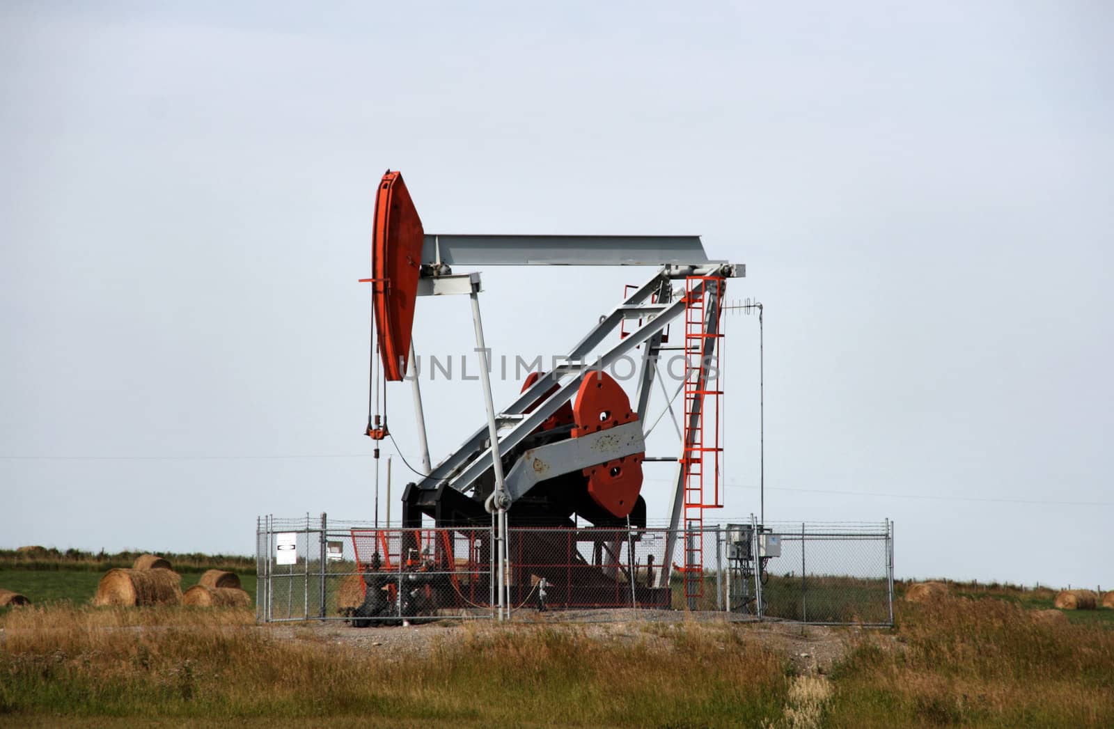 Oil pump jack on Prairie in Alberta, Canada