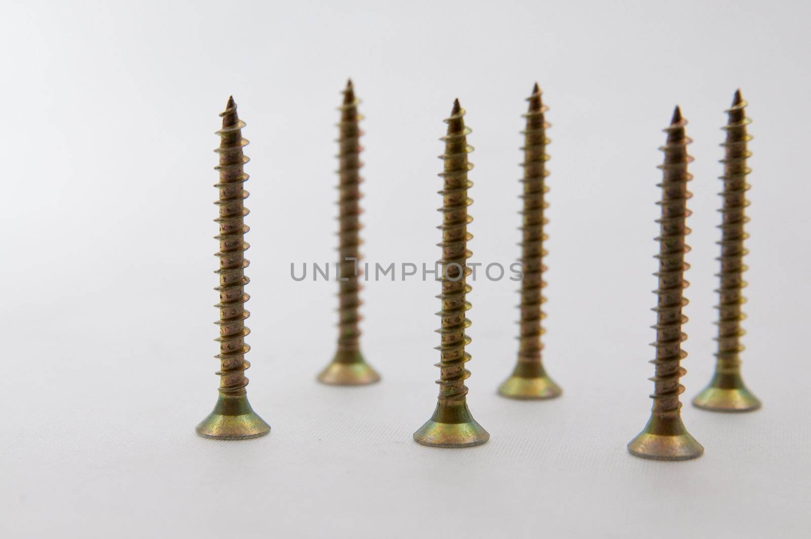 the picture of the stack of screws 