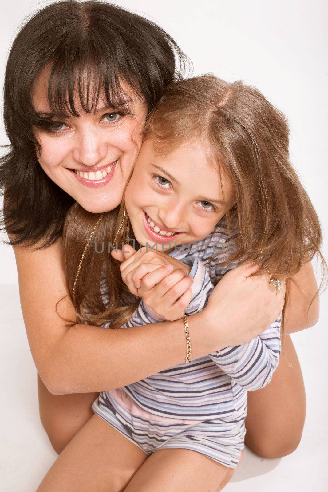 portrait of cute young girl and her mother