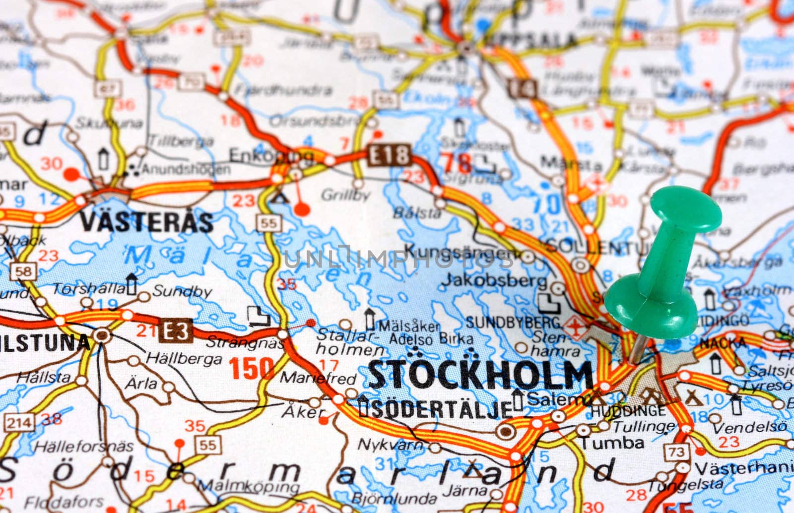 Stockholm in Sweden, Europe. Push pin on an old map showing travel destination. Selective focus.
