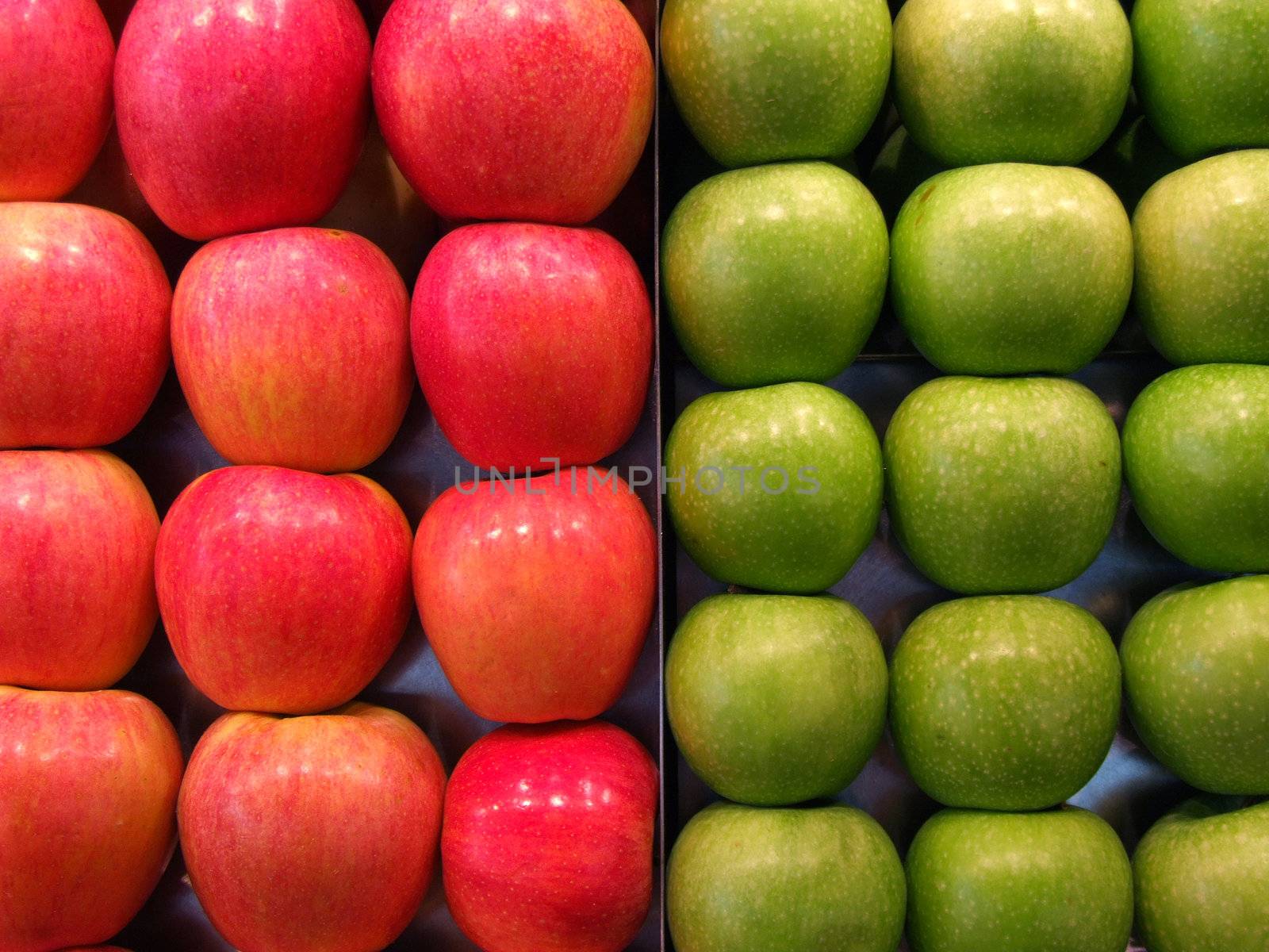 Red and green apples background. Green grocer's shopping.