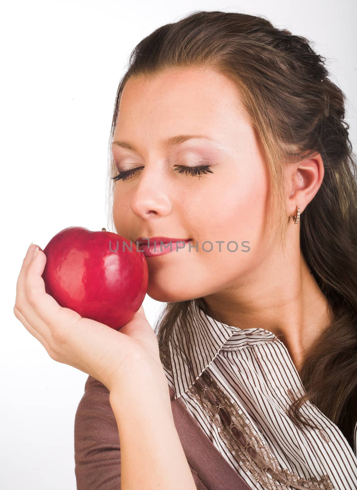  beautiful young smiling woman with red apple.
