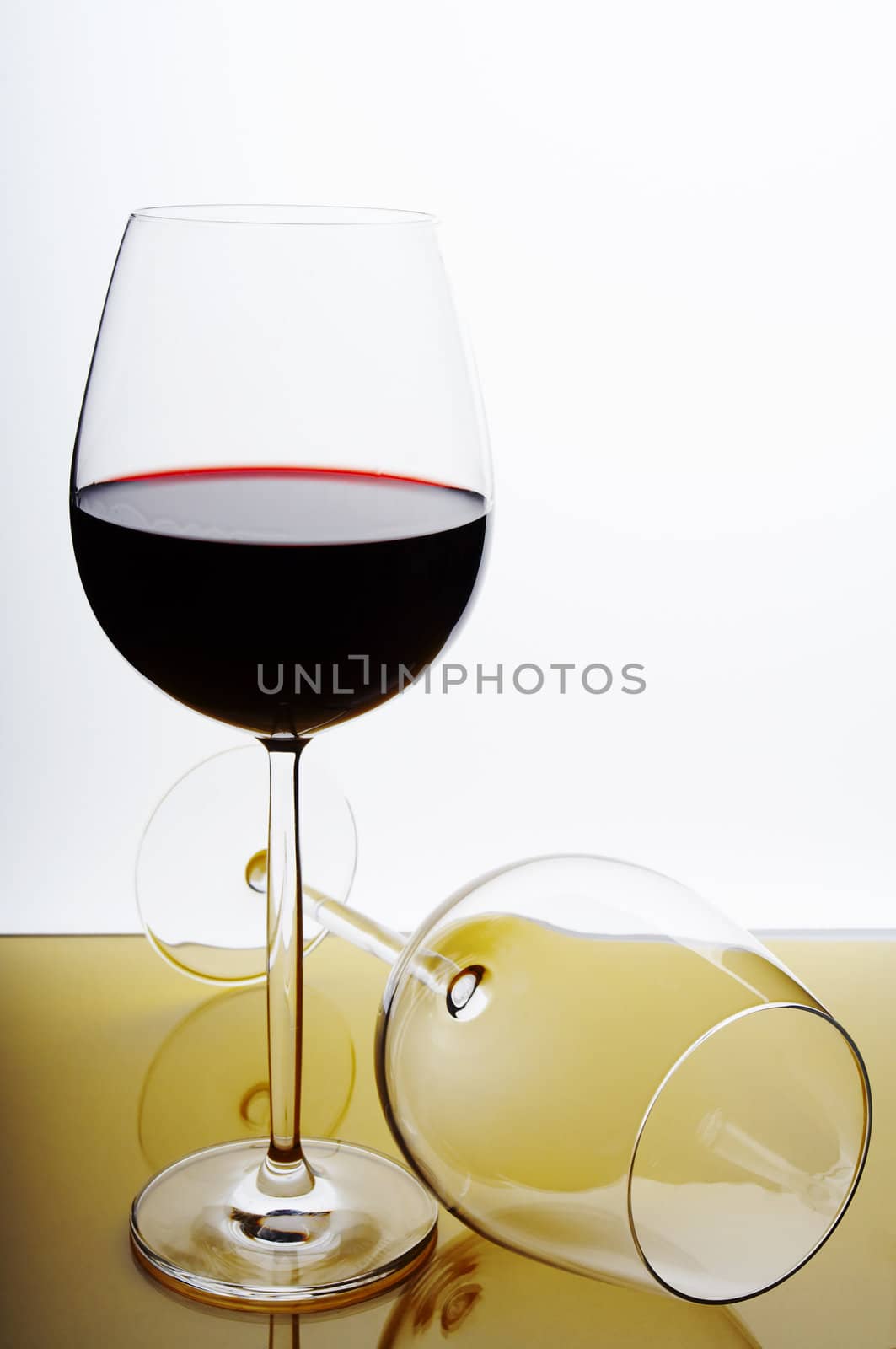 Pair of wine glasses on white background