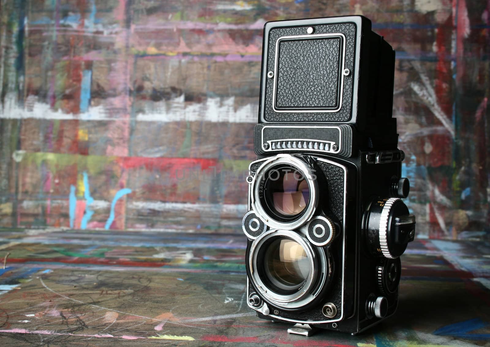 old vintage camera in artist's studio
