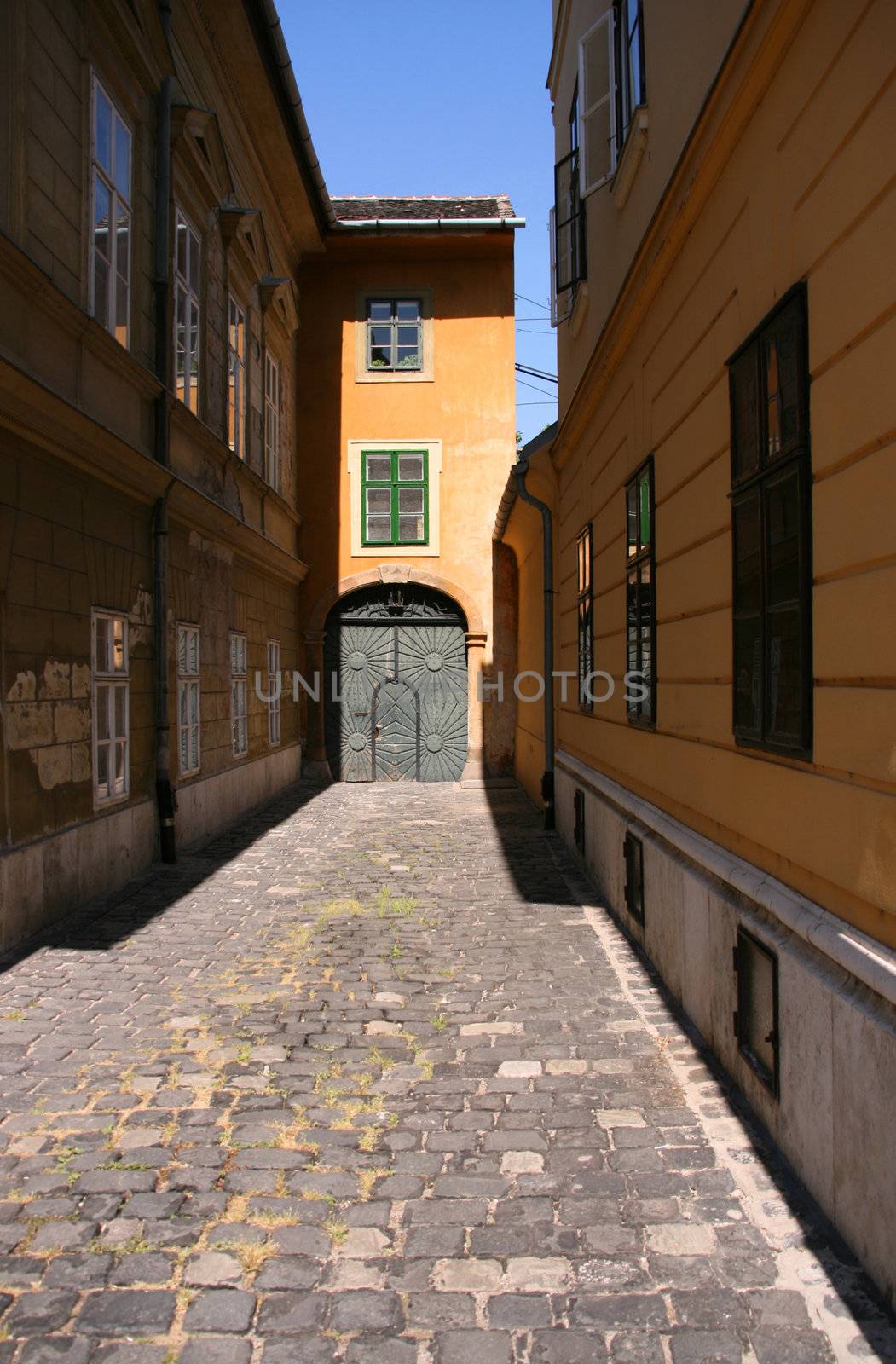 Quaint cobbled street in Budapest, Hungarian capital city.