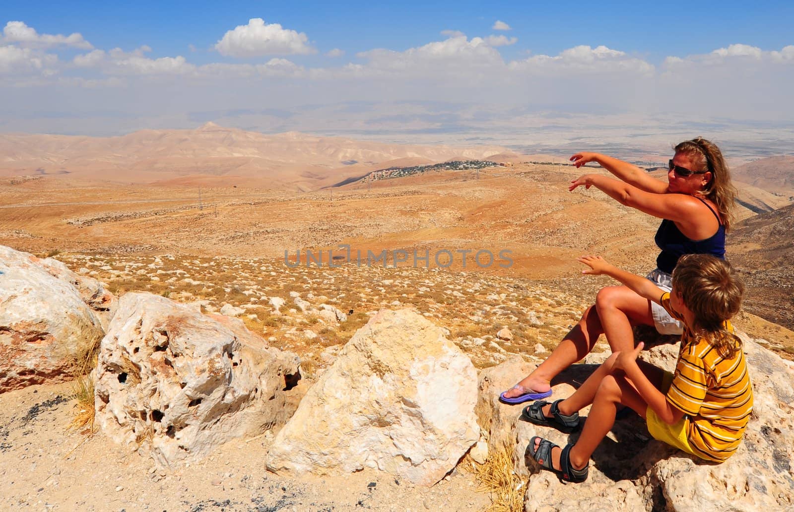Woman And Boy  Posing On The Judea Mountain Top 