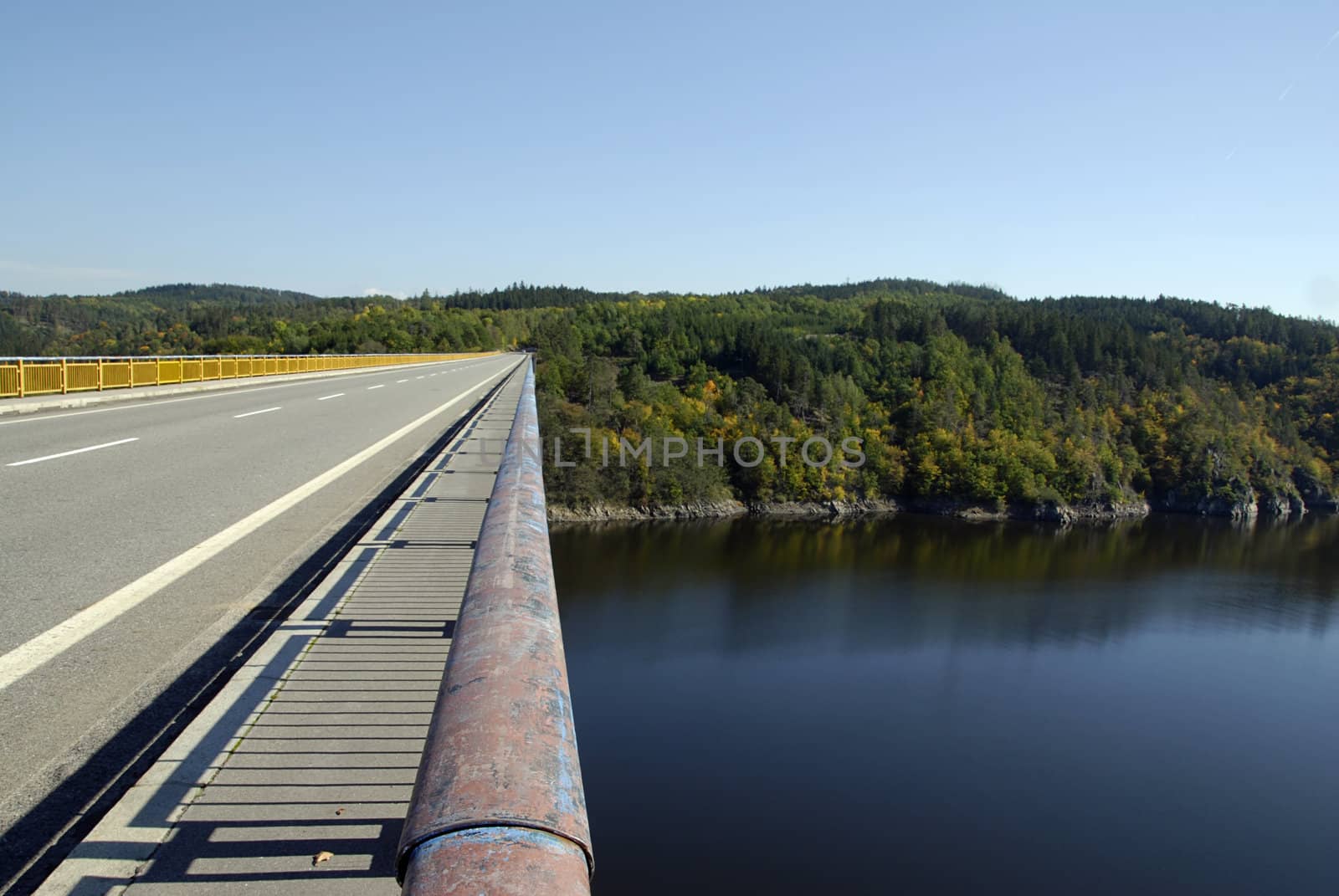 Bridge with road across the Czech river Vltava