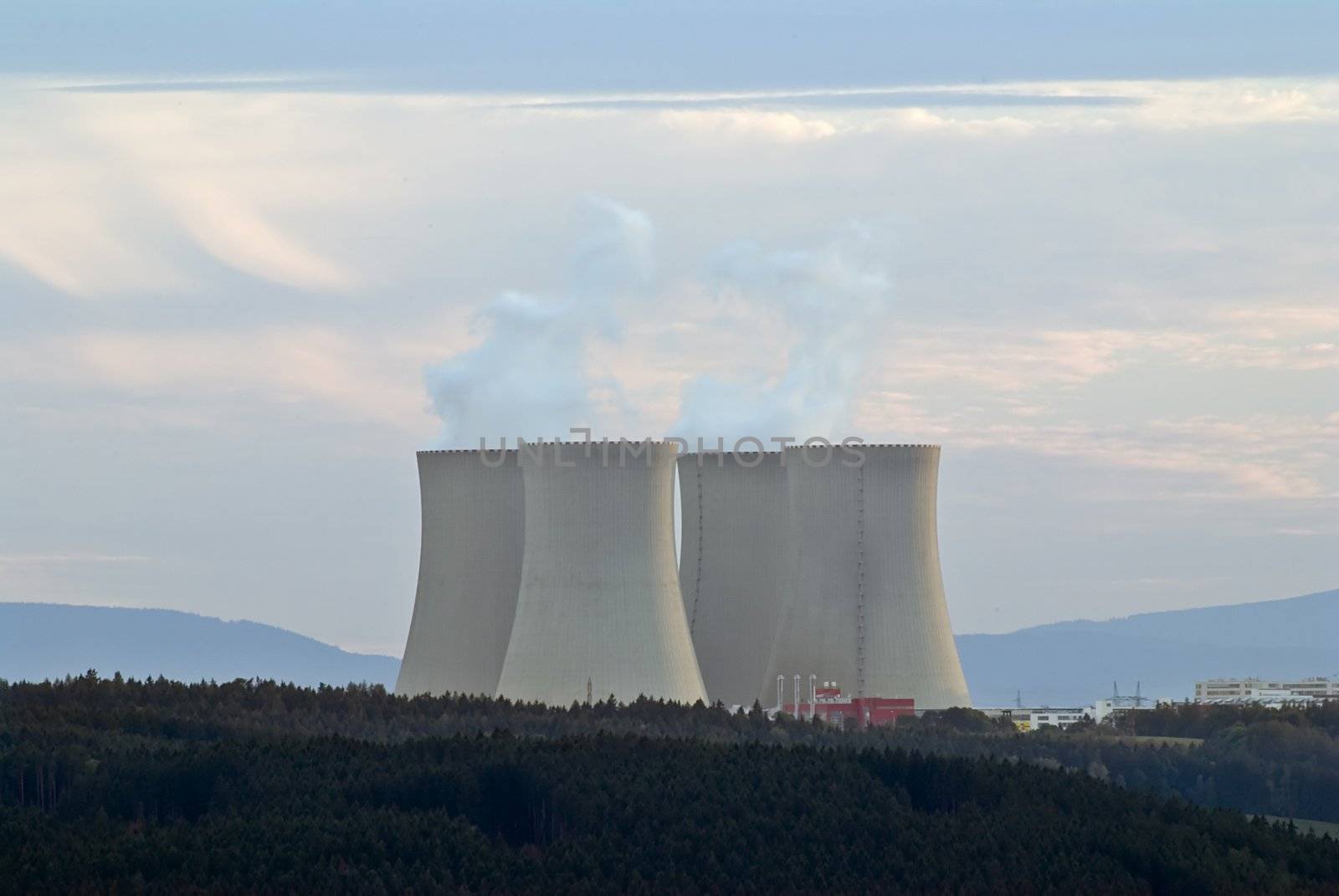 Nuclear power plant with four huge cooling towers