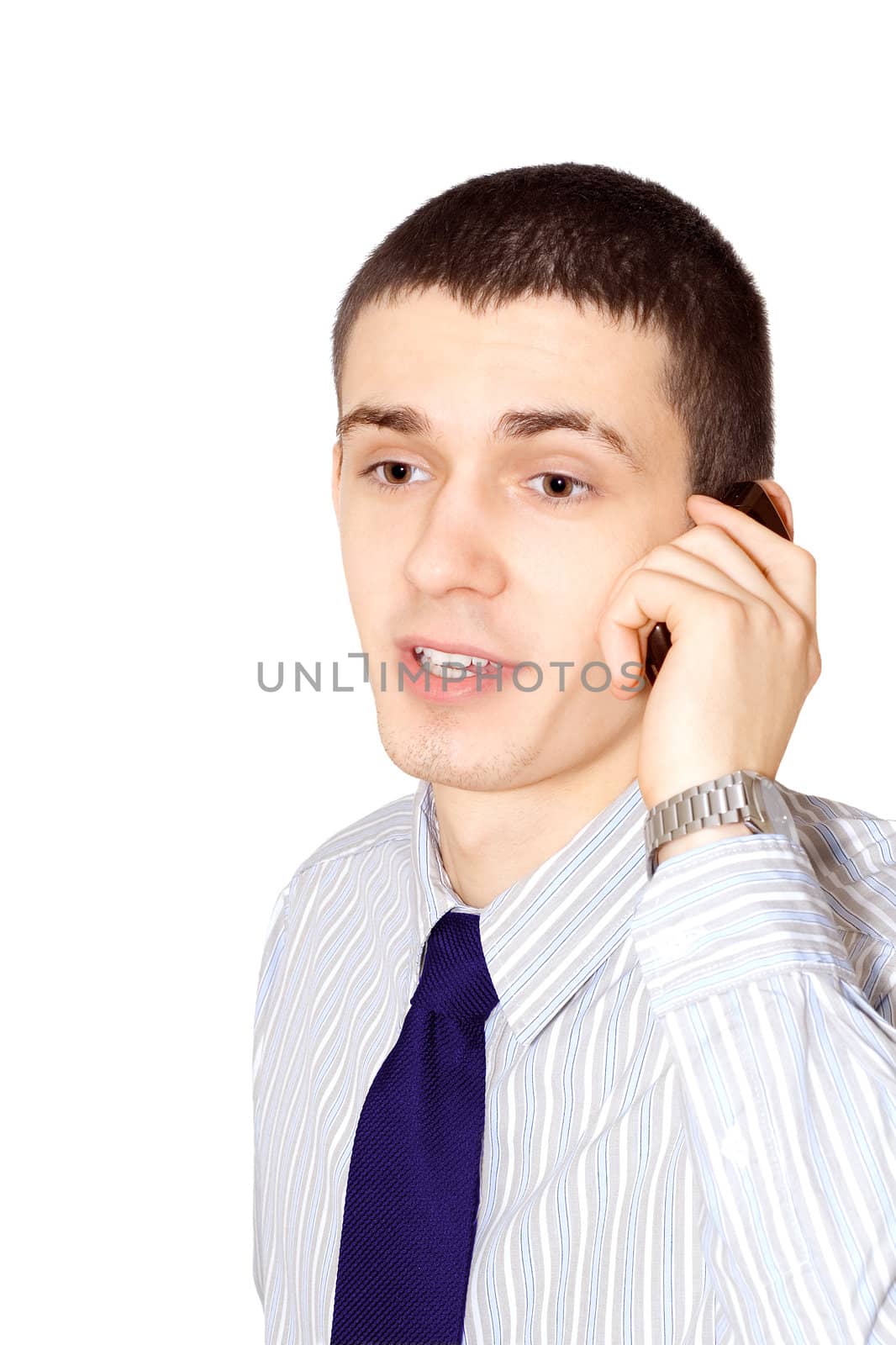 The young man speaks to mobile phone
