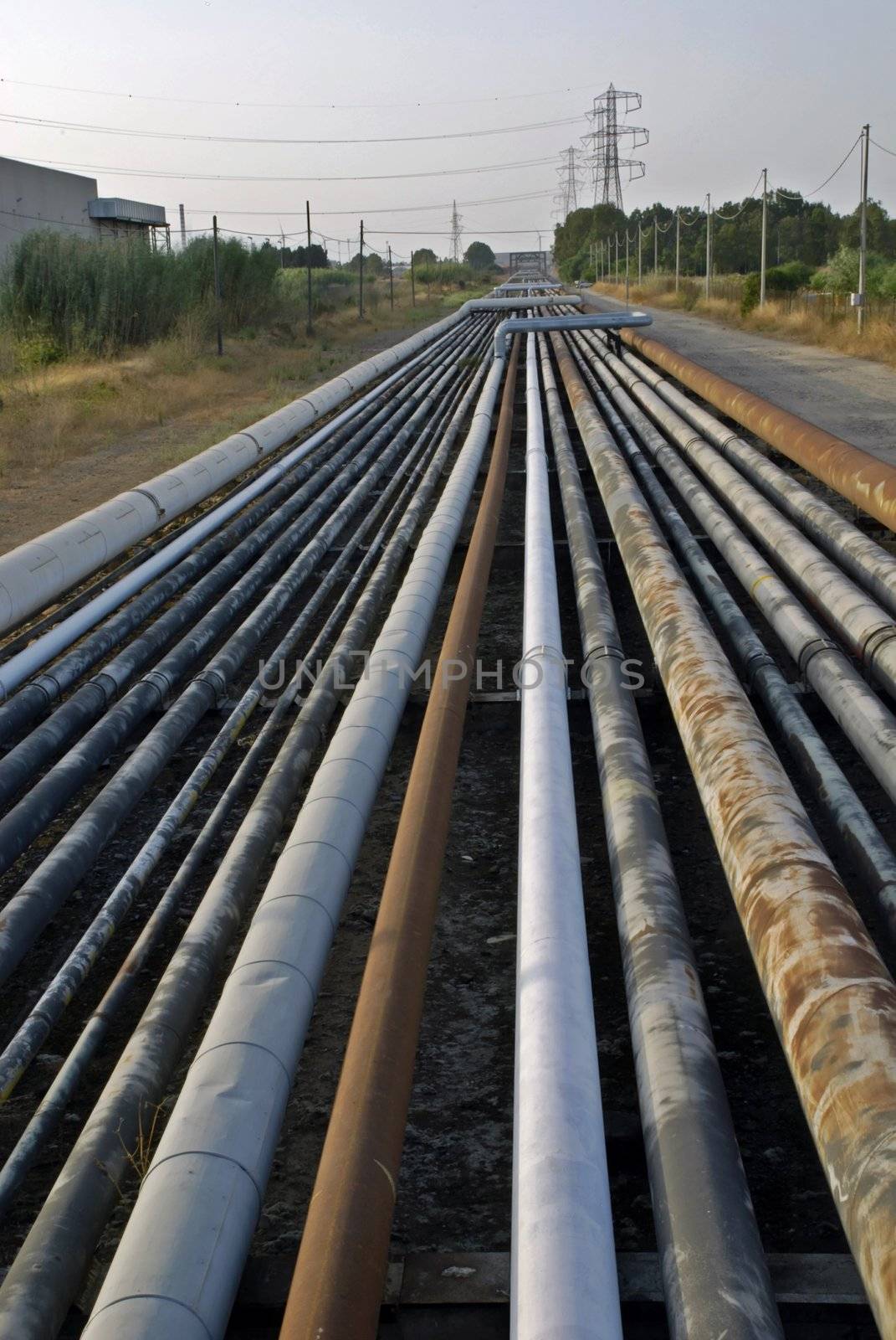 Pipes with chemicals leading from the oil rafinery