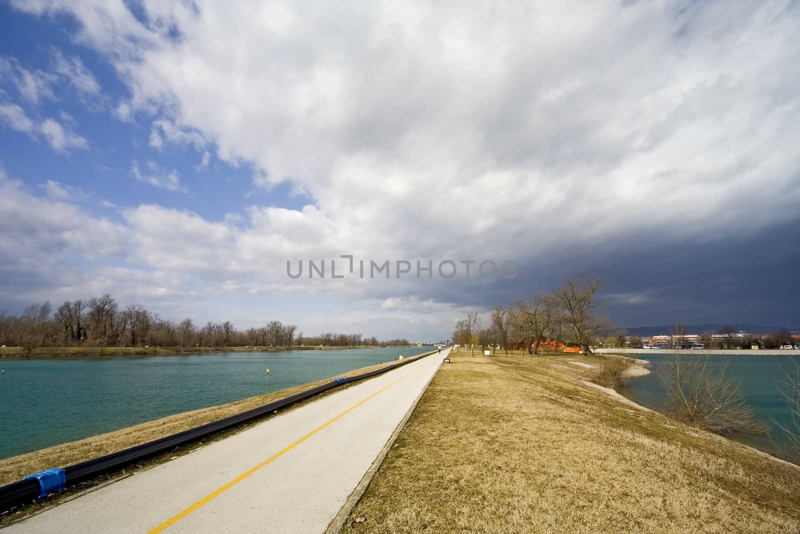Path around the lakes with clouds