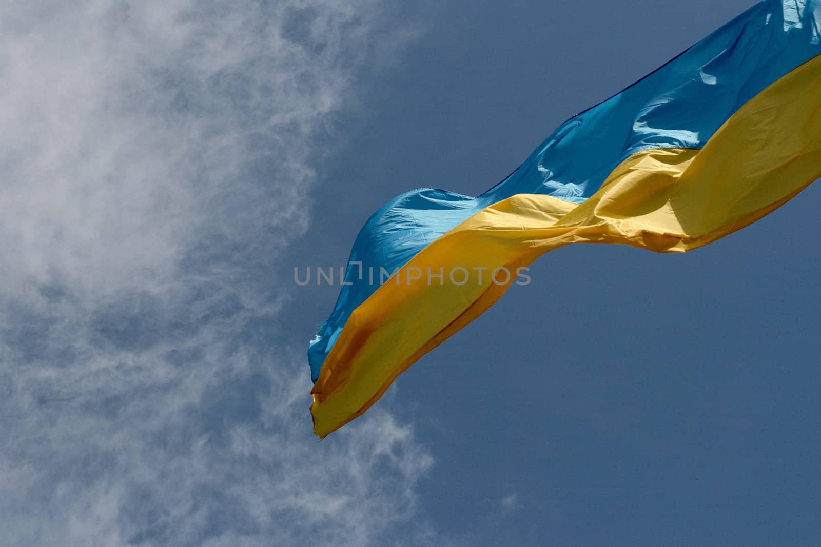 Flag against the dark blue sky