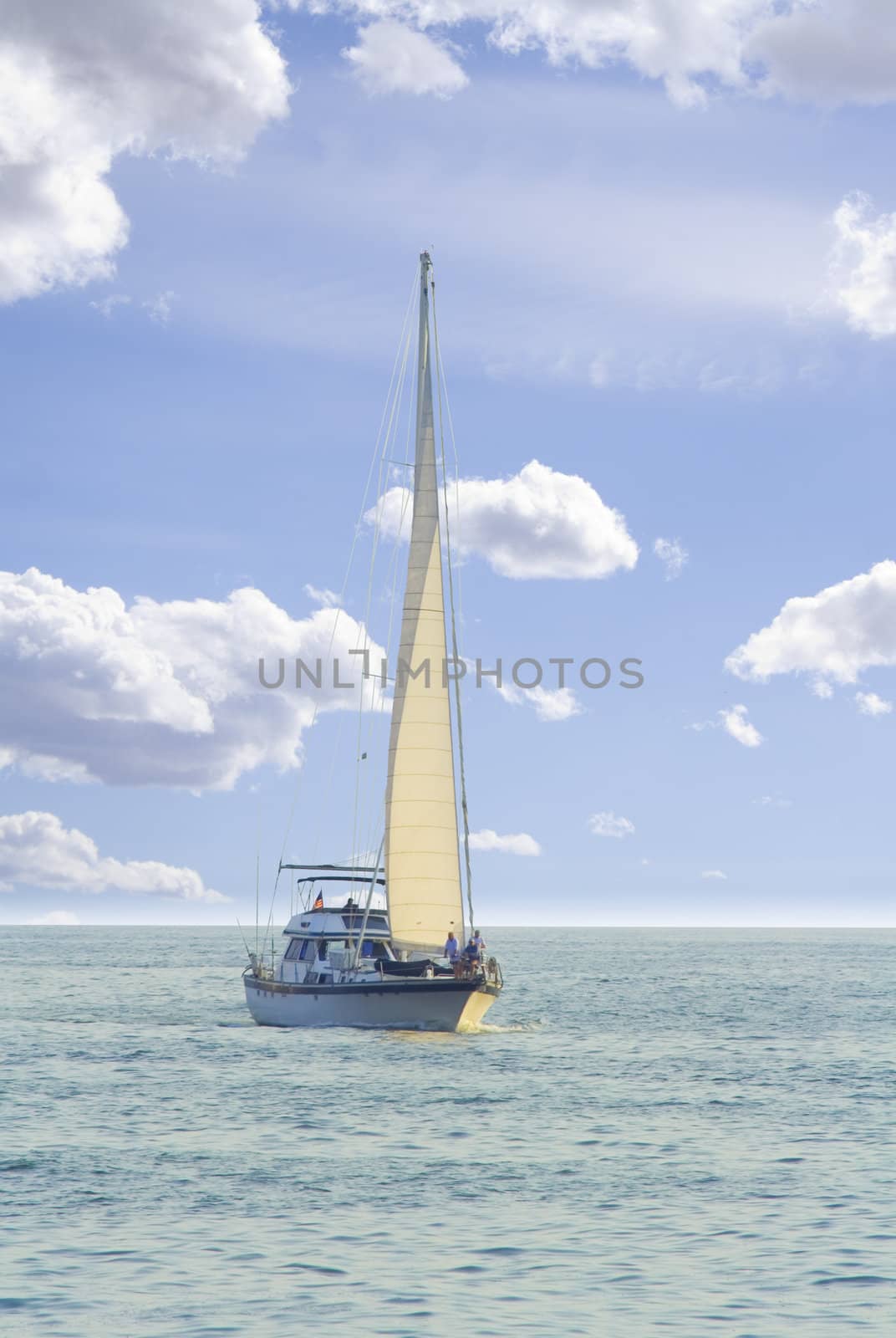 Sailboat in sailing on wide open ocean