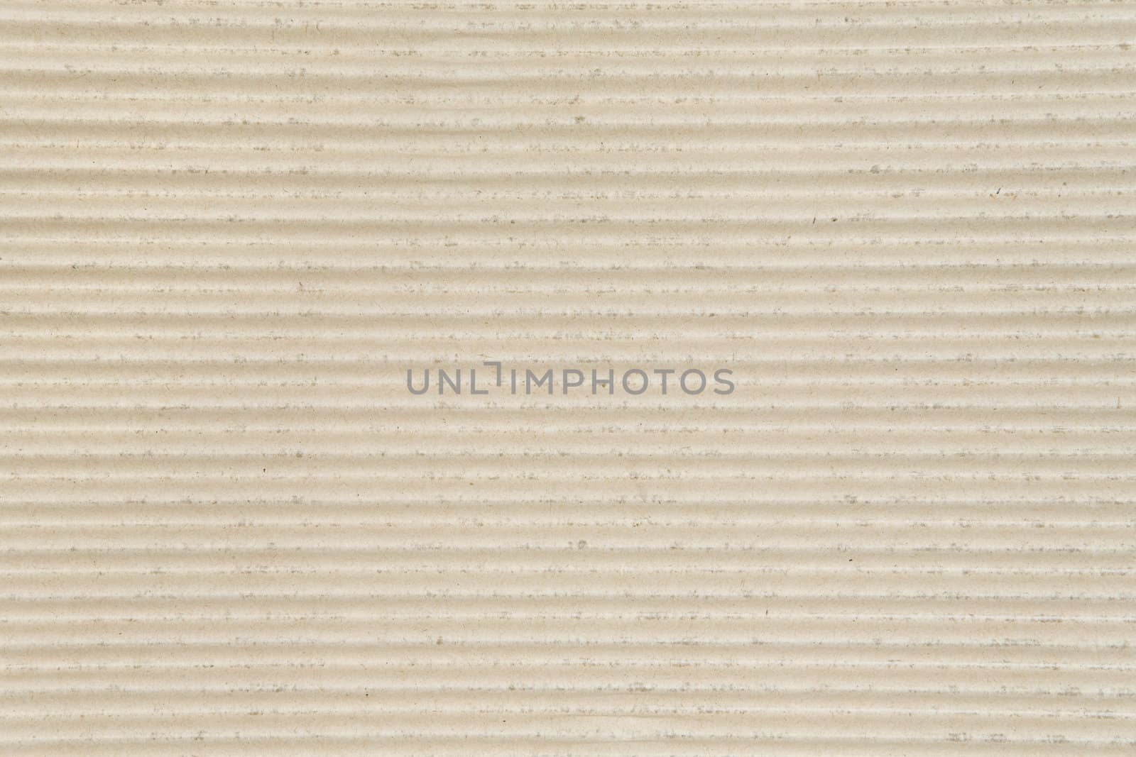 Texture shot of ribbed cardboard.