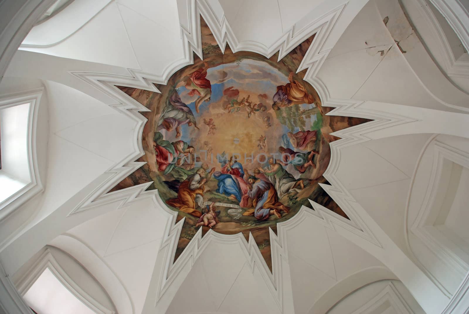 Cupola of cloister church with religious fresco