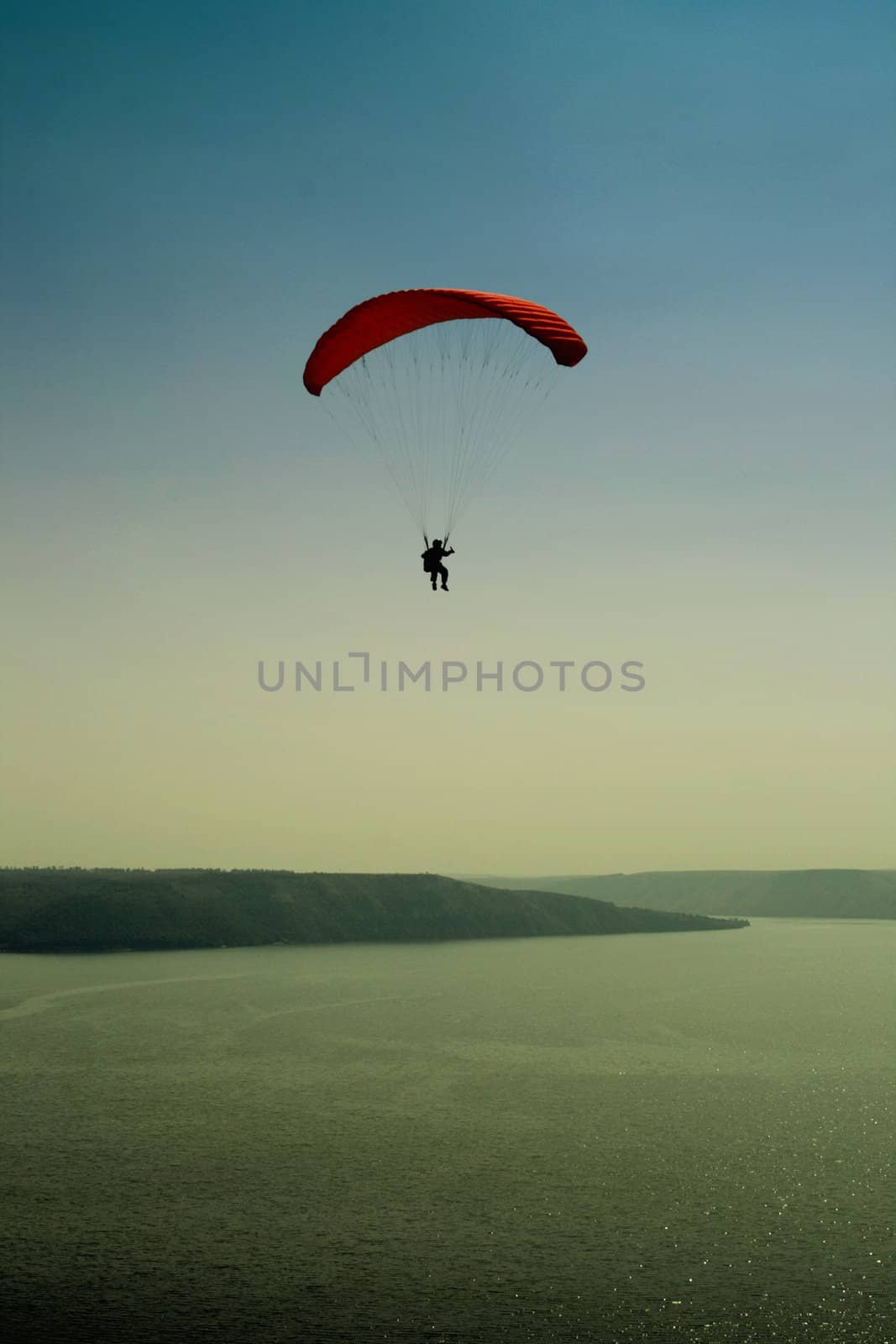 The parachutist in flight by KadunmatriX