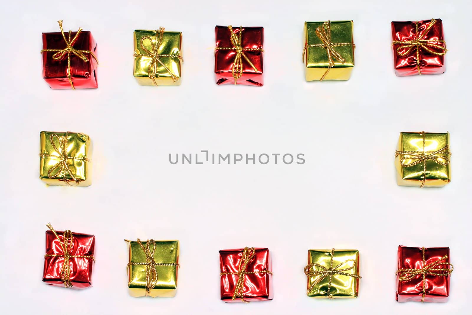 Gold and red presents on white