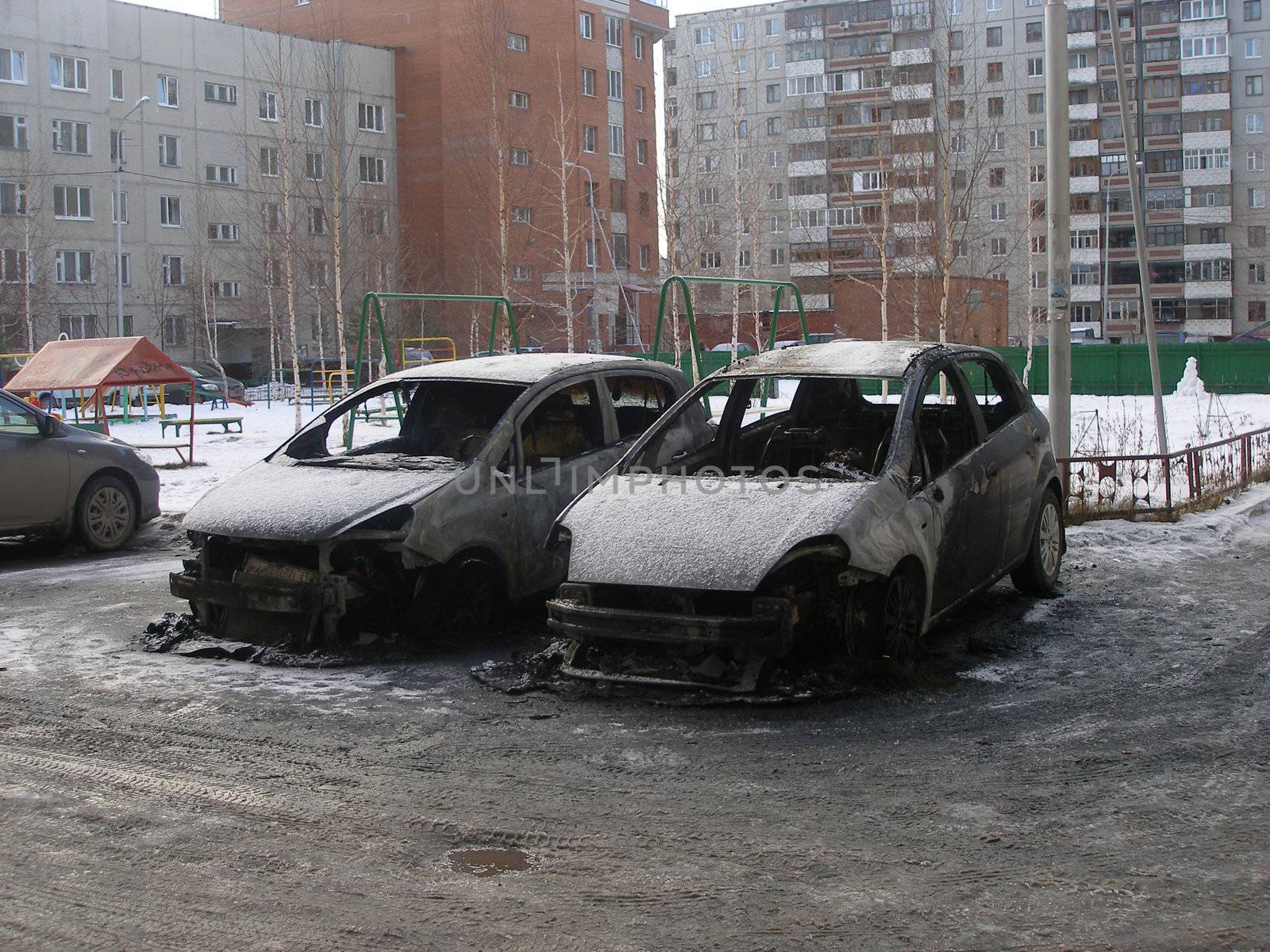 Have burnt down cars in a court yard