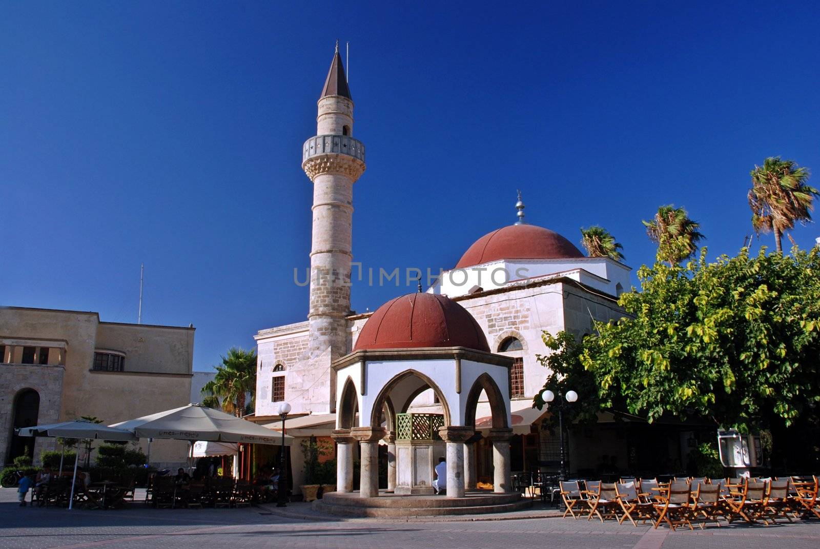 Muslim is praying near the mosque