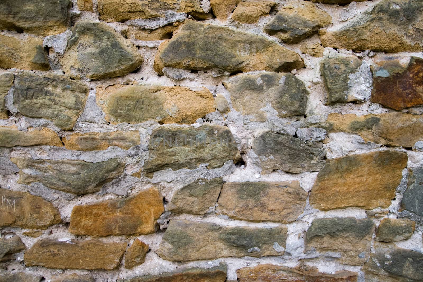 Stone wall of an ancient laying