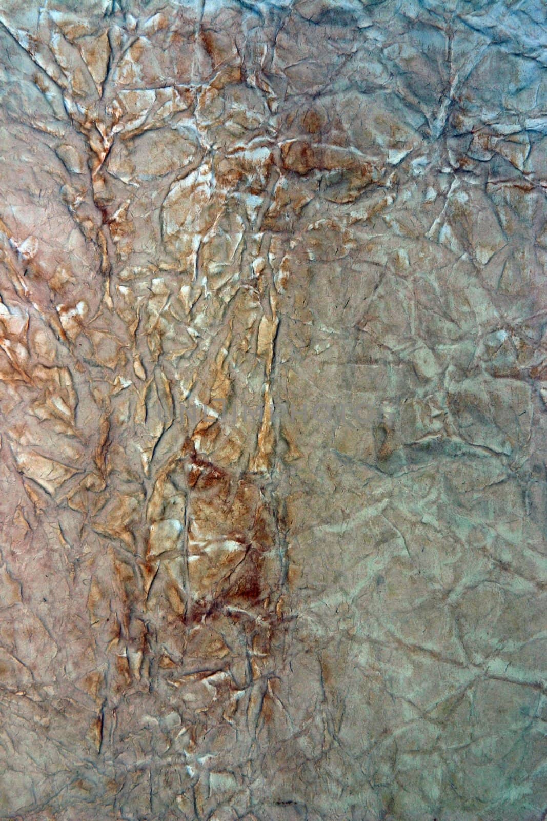 Aged paper with burn marks and ripples