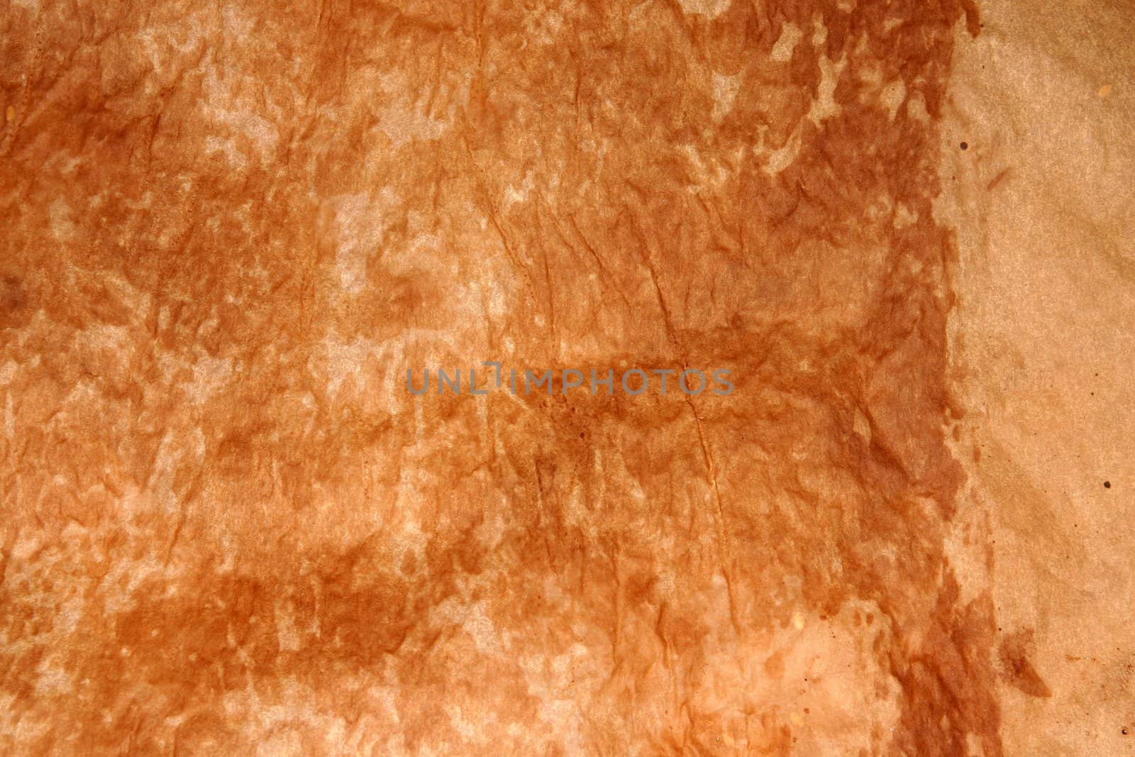 Aged paper with burned marks