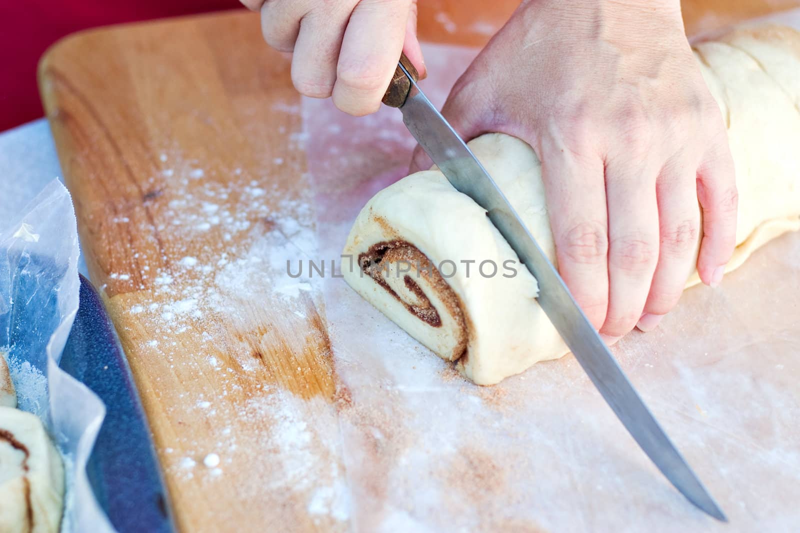 Cutting Cinnamon Roll Dough by StephanieFrey