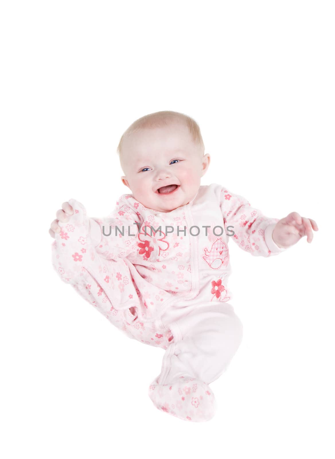 A happy baby playing with her Pajamas foot(high key)