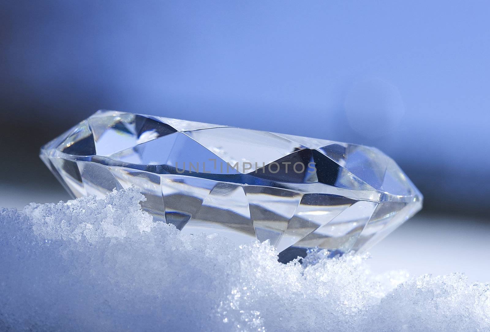 Diamond sitting in snow