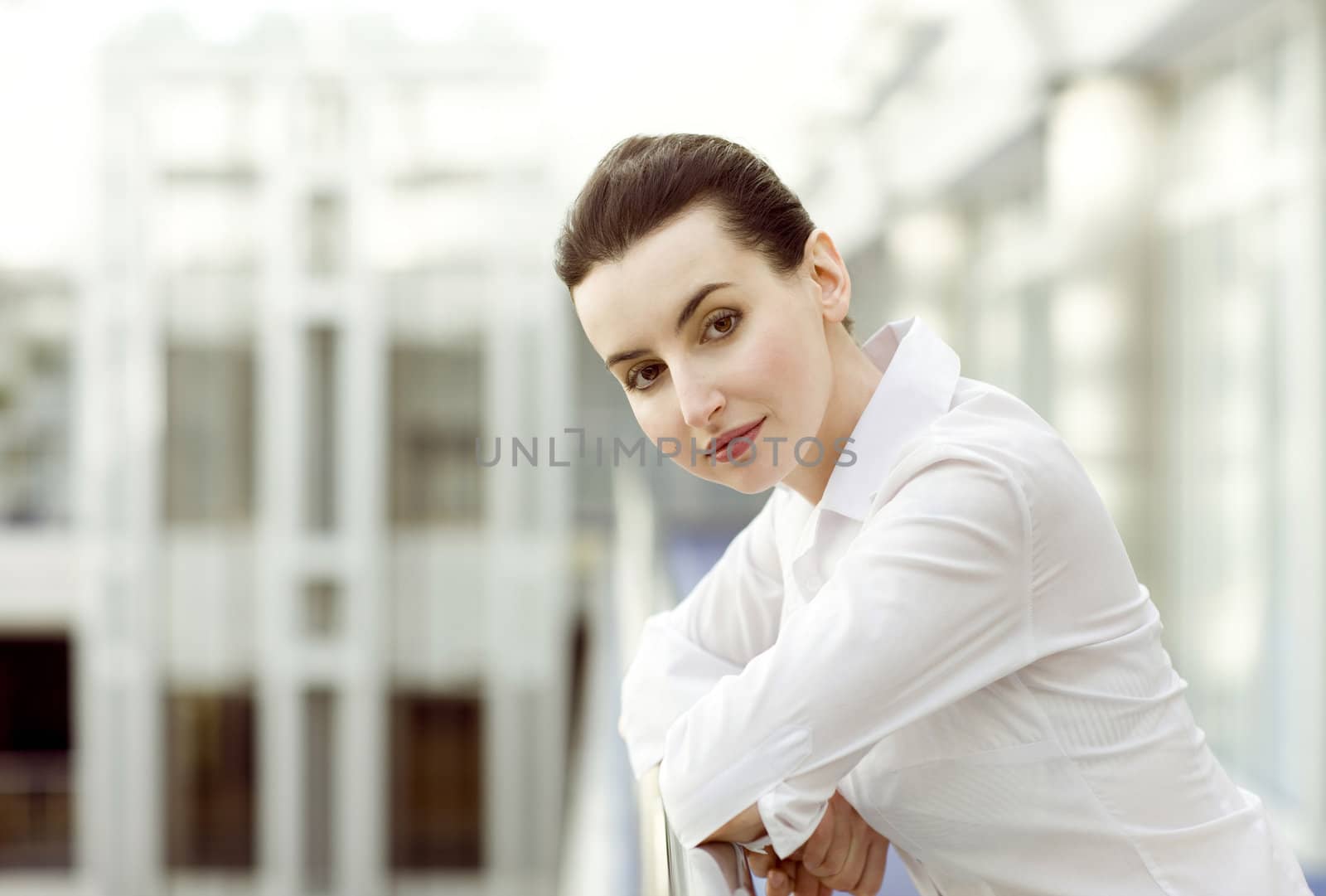 Portrait of young woman in white shirt