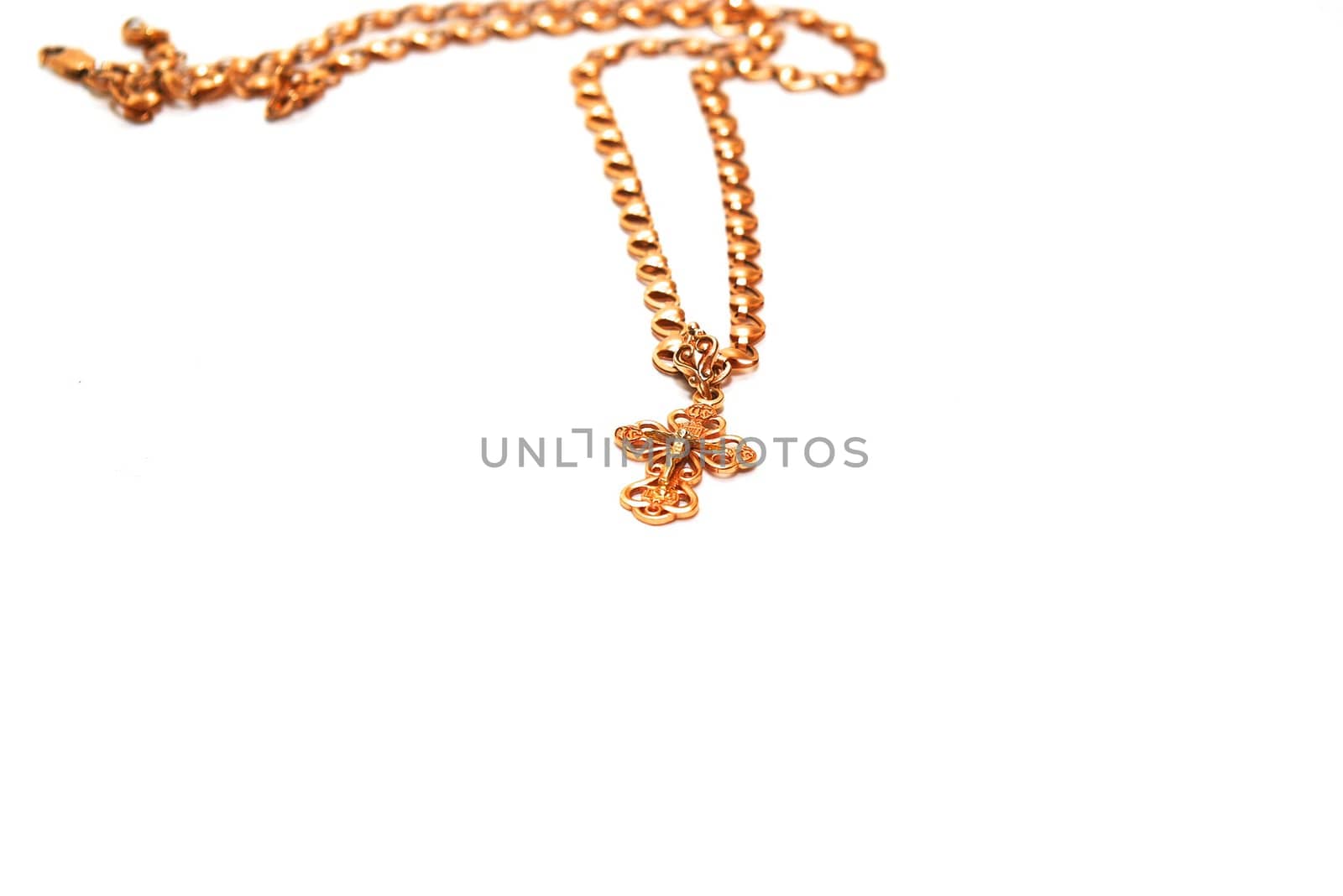 photo of the gold cross on white background
