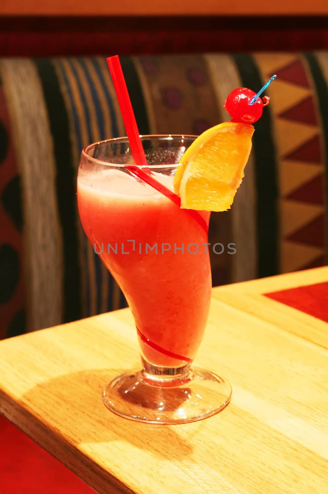 Berry smoothie with garnishments on restaurant table