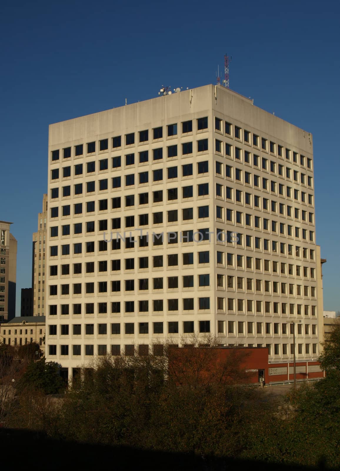 A tall square office building