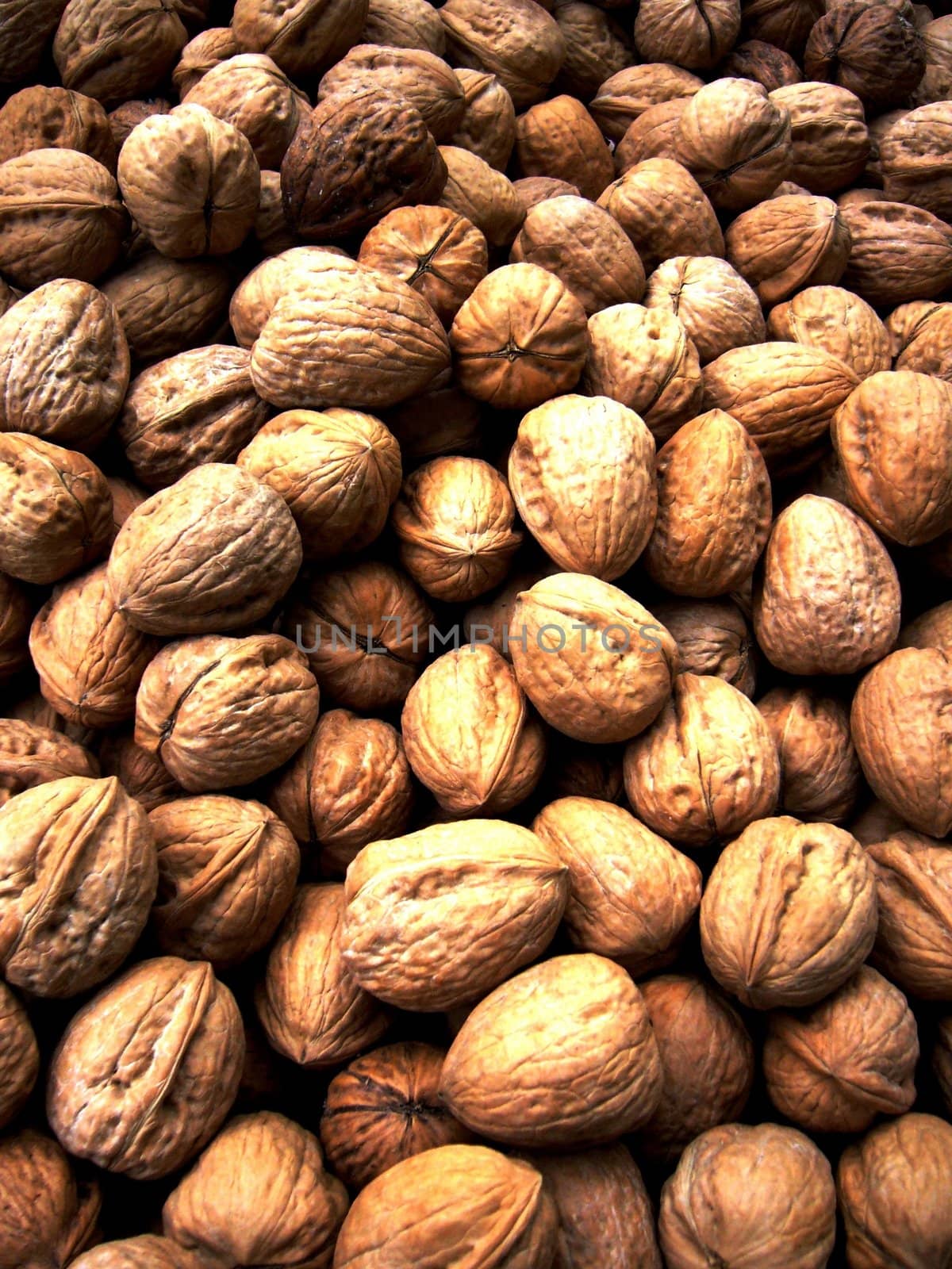 Walnut on the counter of sundey market "El Pozo" in Madrid /Spain/.