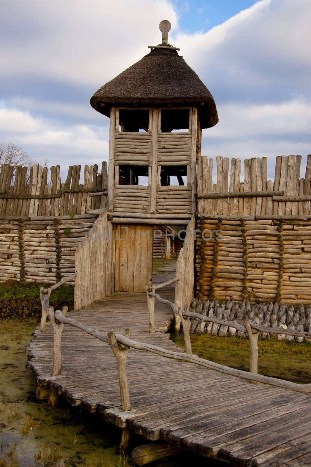 Small wooden bridge, wall and tower in Biskupin - Poland