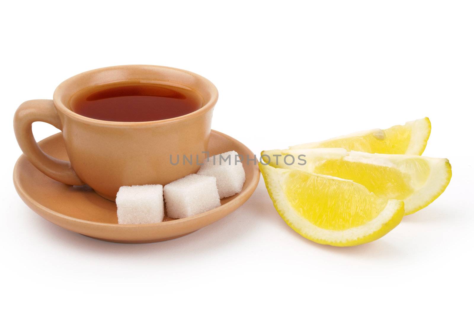 a cup of black tea with shigar pieces and lemon slices isolated on white background