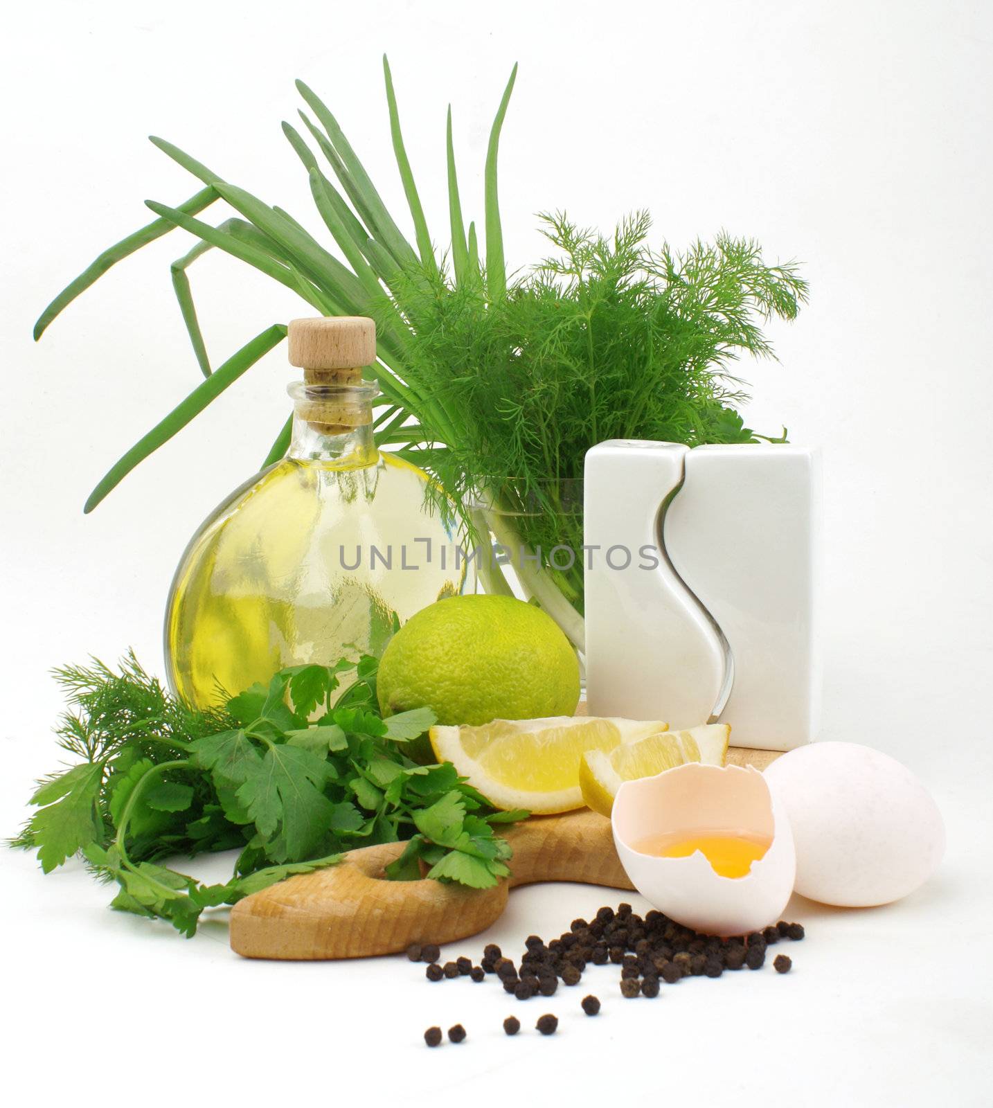 nice fresh herbs, leek, lemon, lime, spices, oil and eggs isolated on white background                  