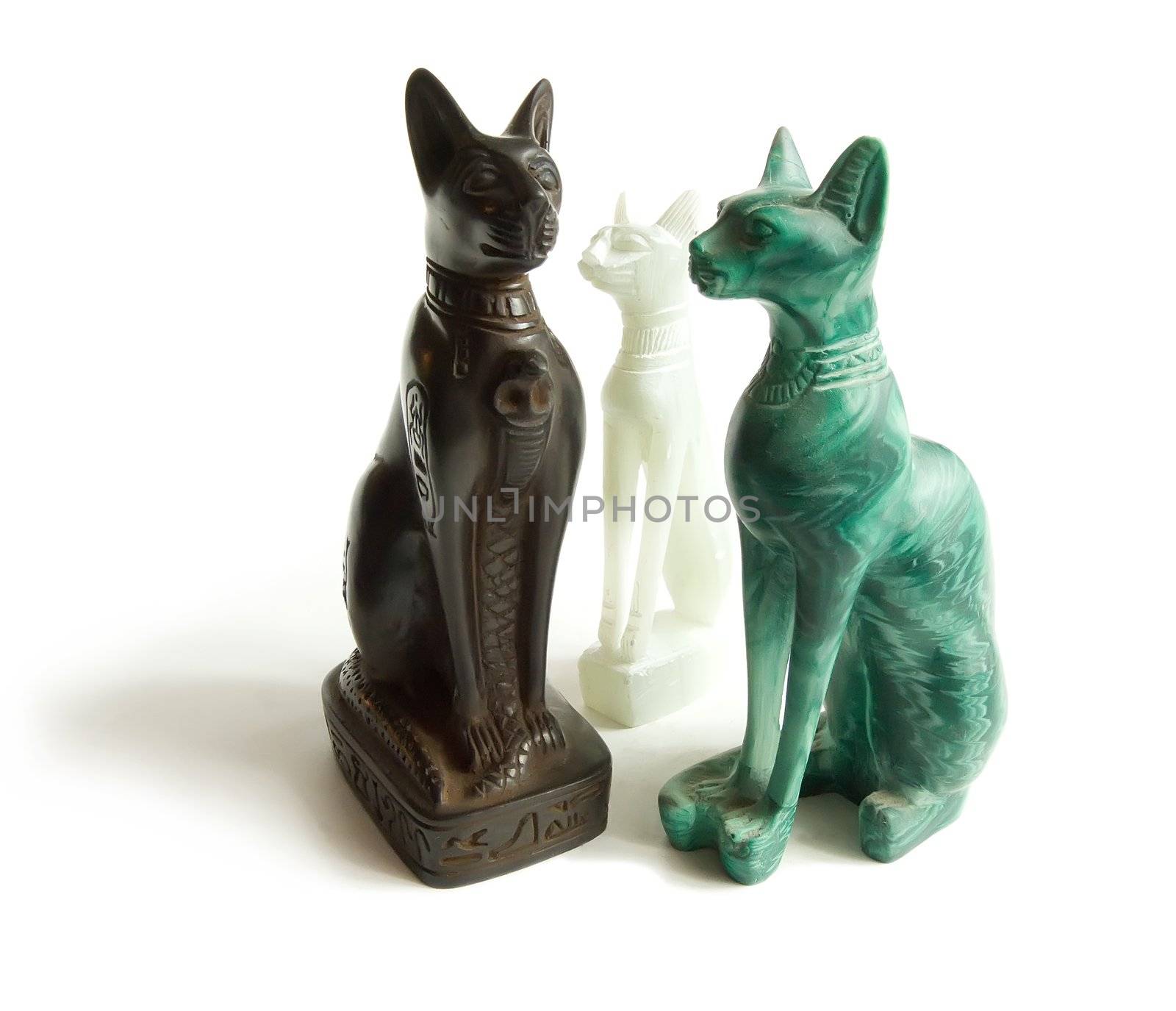 Stone Egyptian cats on a white background 