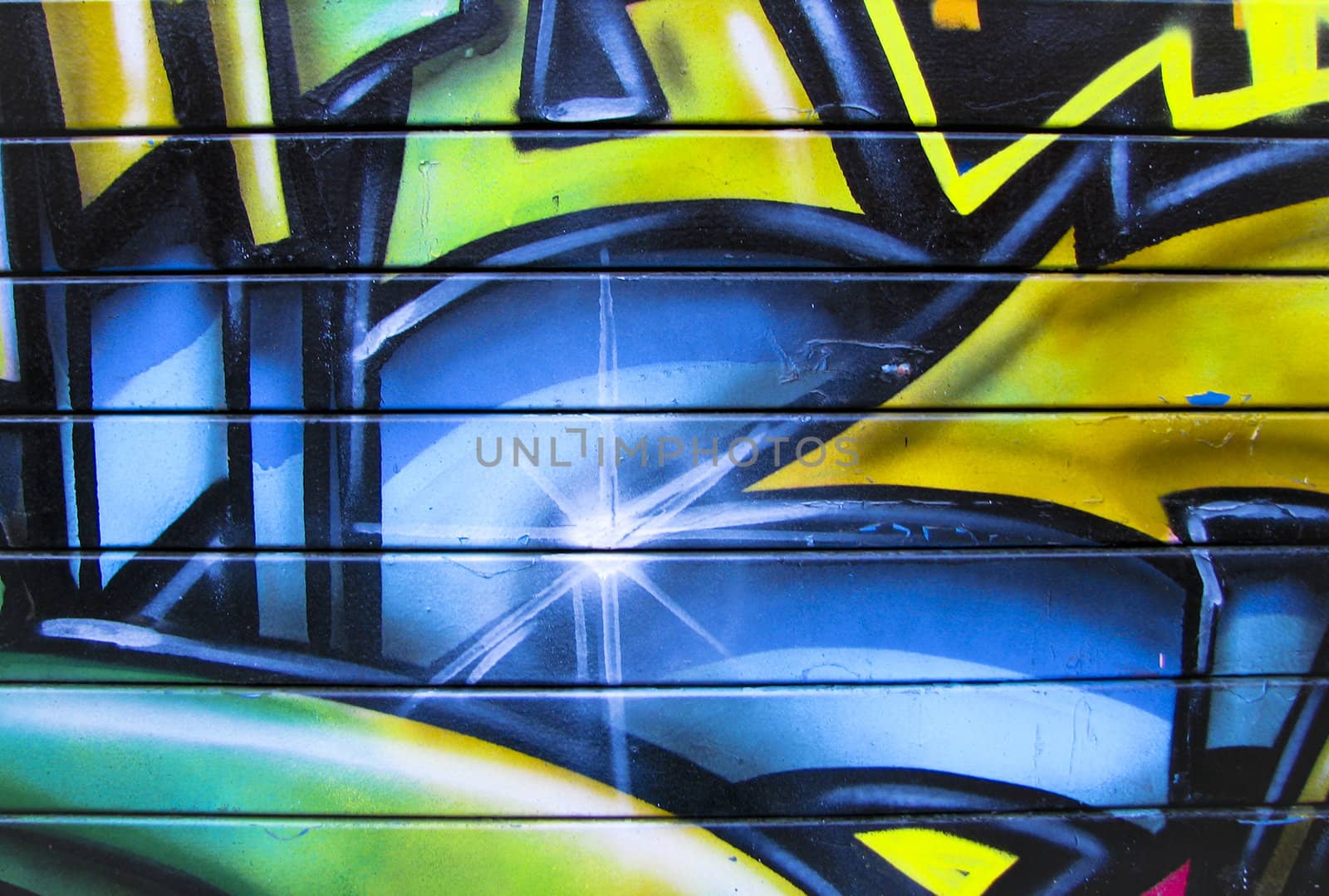 Blue and yellow abstract painting on garage door by ADavis