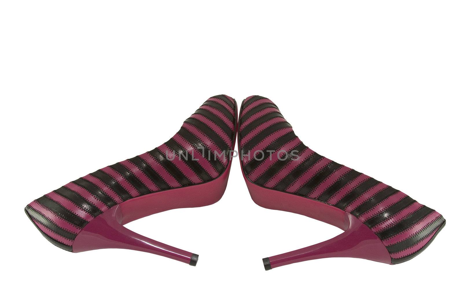 two shoe black and pink lie on background by Jaklin