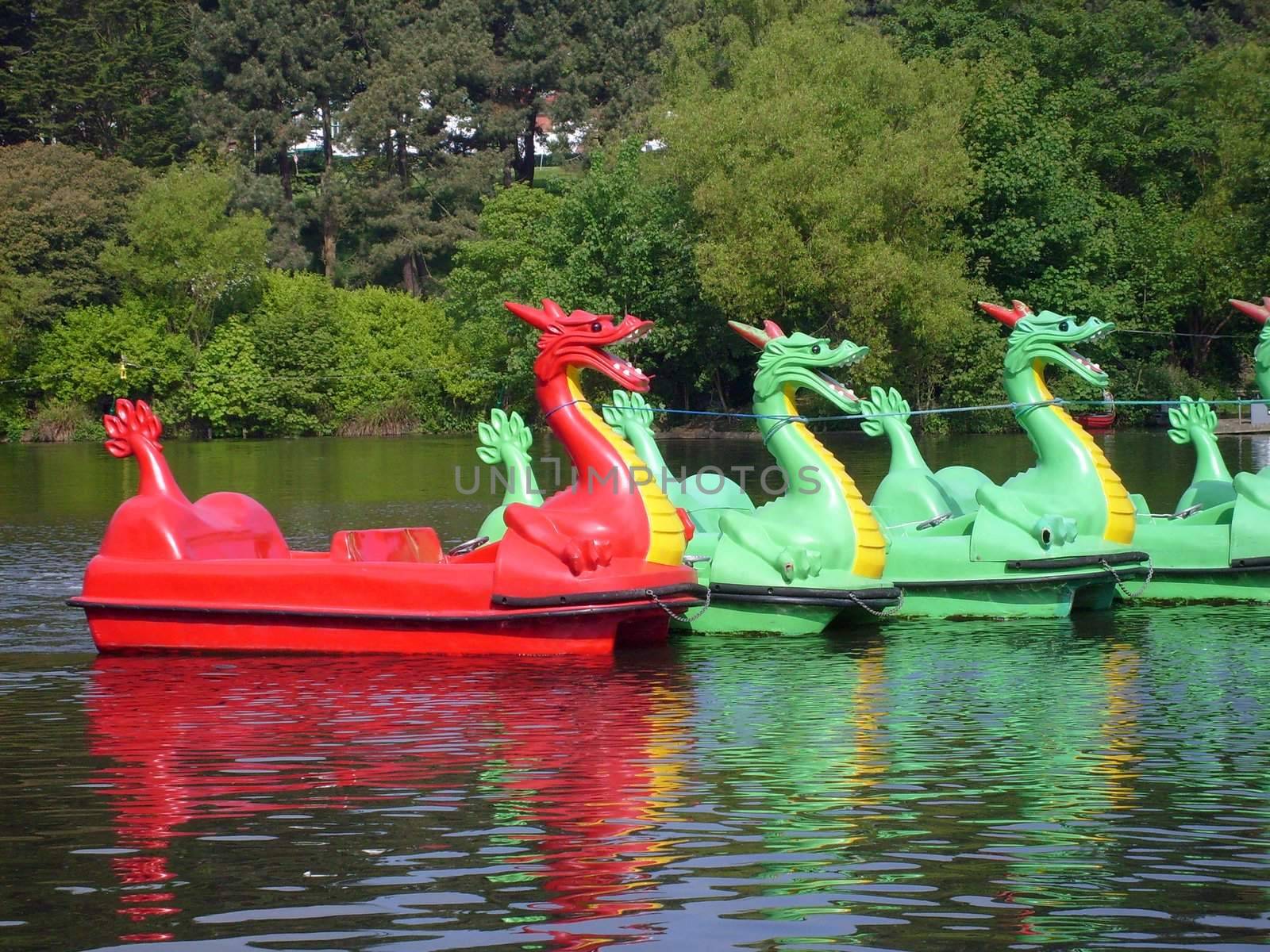 Dragon boats on boating lake in Peasholm Park, Scarborough, England.