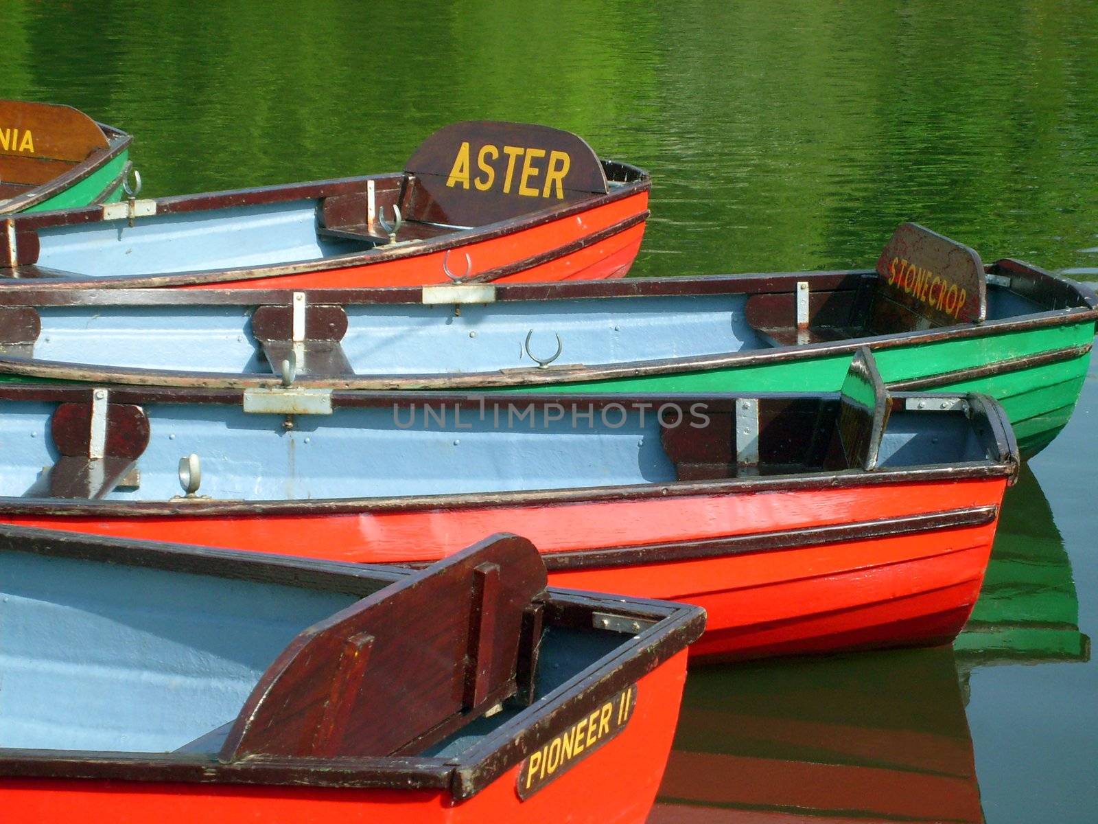 Colorful boats on boating lake in Peasholm Park, Scarborough, England.